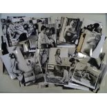 A large quantity of 1960s/70s black/white glamour photographs - 200+