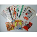 A large selection of mixed movie campaign books, magazines and other memorabilia as lotted