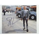 AUTOGRAPHS: JAMES BOND: A pair of signed 10x8 photographs DANIEL CRAIG and ROGER MOORE - these items