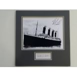 TITANIC - A pair of autographed items to include a photograph of the ill fated ship and a replica