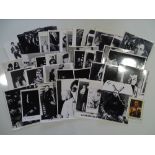 A large group of black / white stills featuring punk and new wave bands, some possibly