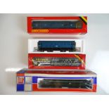 OO SCALE MODEL RAILWAYS: A group of diesel locomot