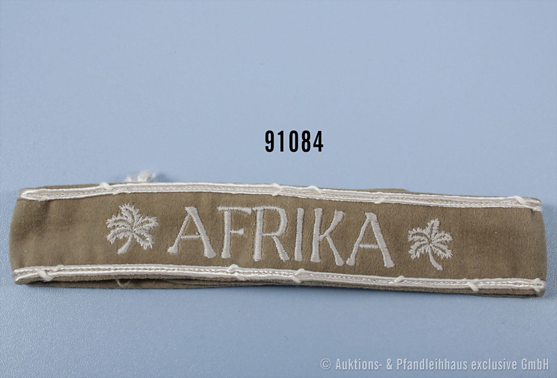 Ärmelband "Afrika", Kamelhaarausf., L ca. 48 cm, guter Zustand mit Altersspuren