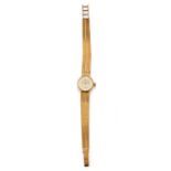 Ticin - A 18K yellow gold lady's wristwatch, Ticin - A 18K yellow gold lady's [...]