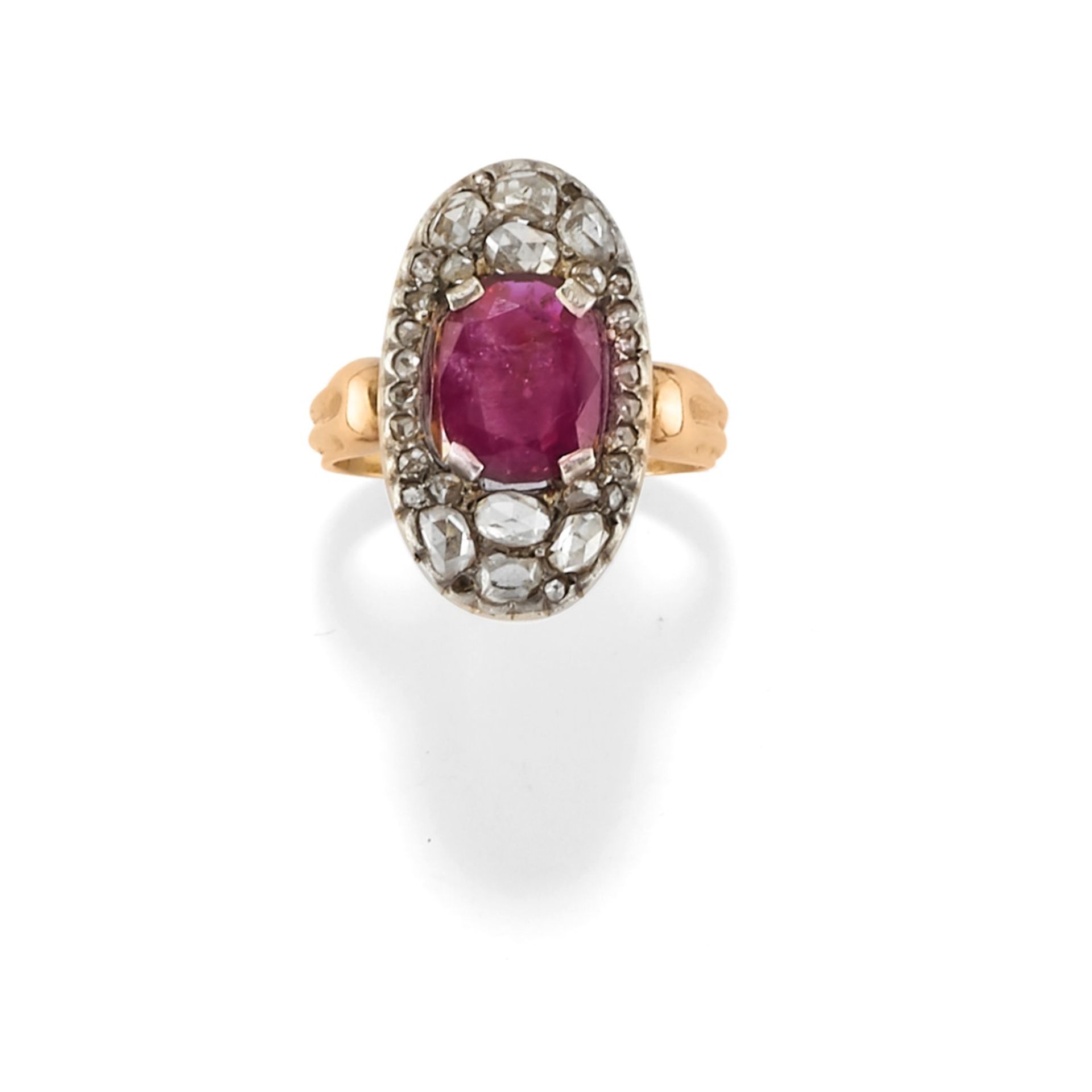 A silver, 18K yellow gold, ruby and diamond ring, first half of 20th Century - A [...]