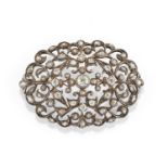 A silver, 18K yellow gold and diamond brooch, early 20th Century - A silver, 18K [...]