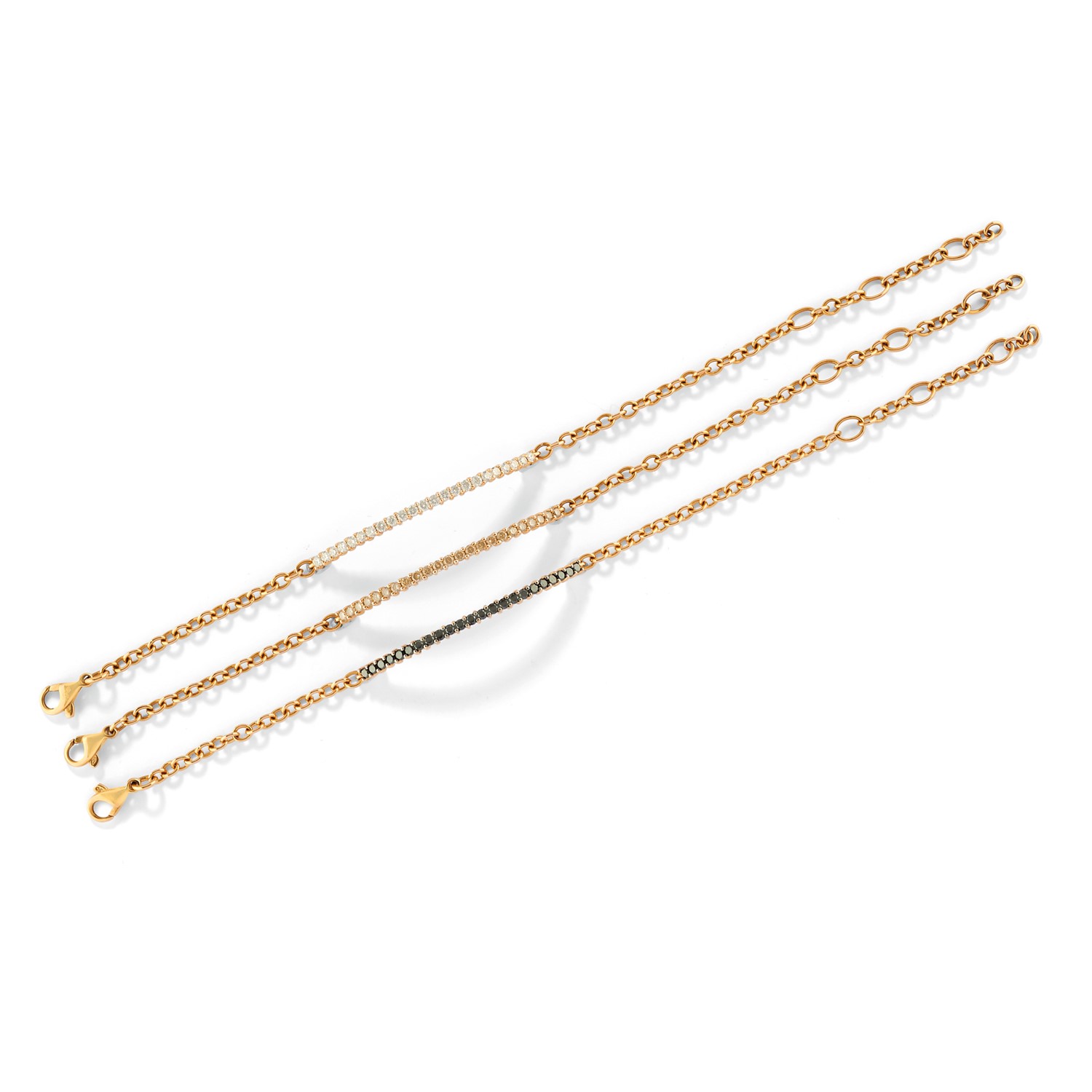 Three 18K yellow gold and diamond bracelets - Three 18K yellow gold and diamond [...]