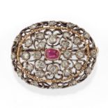 Mario Buccellati - A silver, 18K yellow gold, ruby and diamond brooch, Mario [...]