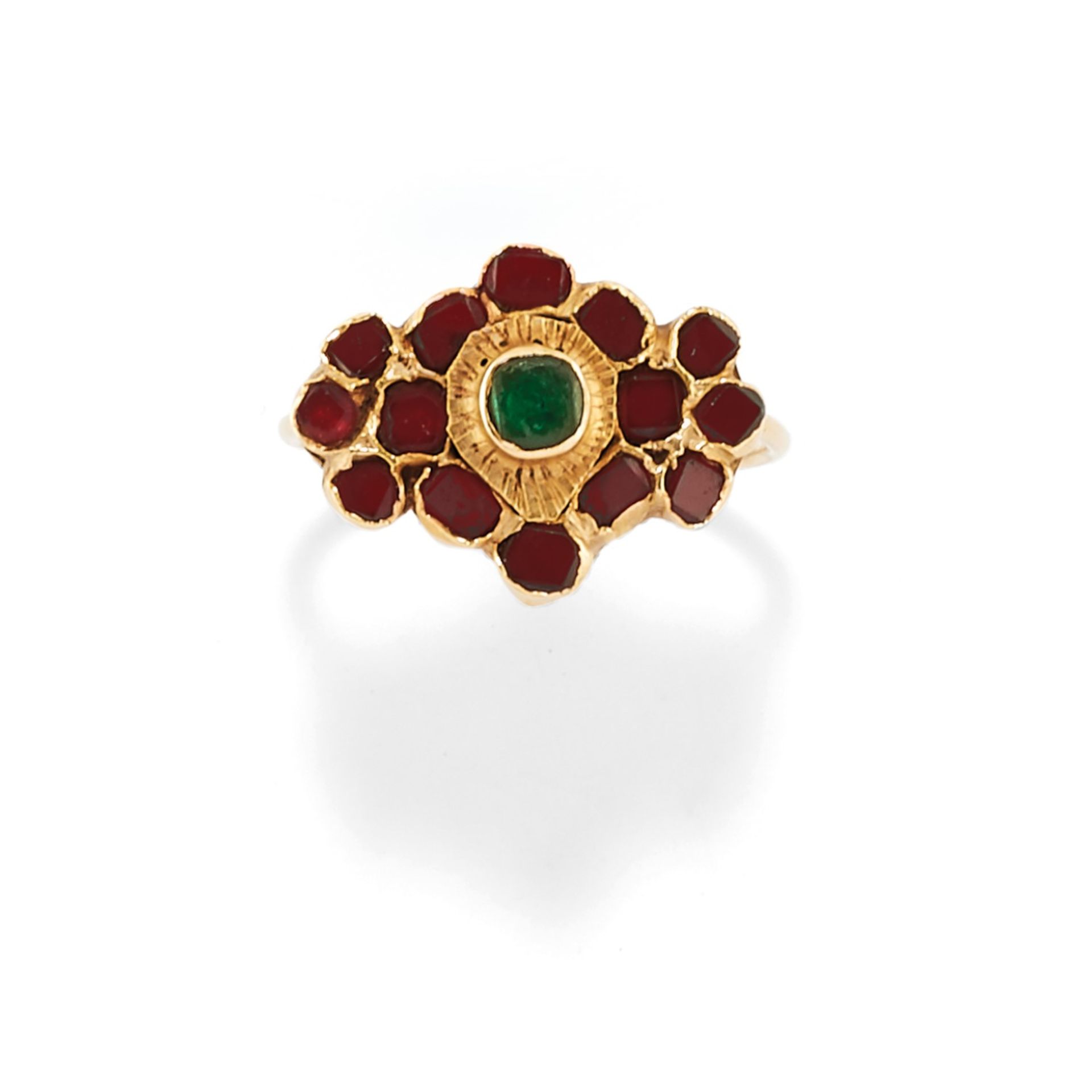 A 18K yellow gold, green gemstone and garnet ring, south-Italy 17th Century - A 18K [...]