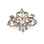 A silver, 18K yellow gold, pearl and diamond brooch, first half of 20th Century - A [...]