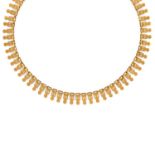 A 18K yellow gold necklace, circa 1950 - A 18K yellow gold necklace, circa 1950 - [...]