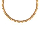 A 18K yellow gold necklace, circa 1950 - A 18K yellow gold necklace, circa 1950 - [...]