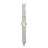 Universal - A 18K white gold lady's wristwatch, Universal - A 18K white gold lady's [...]