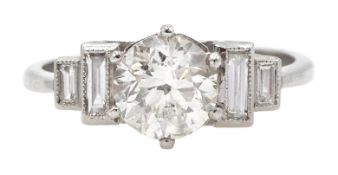 Art Deco style platinum ring set with central old cut diamond and diamonds to shoulders, central di