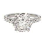 Platinum old cut diamond solitaire ring with diamond set shoulders, hallmarked, central diamond 2.1