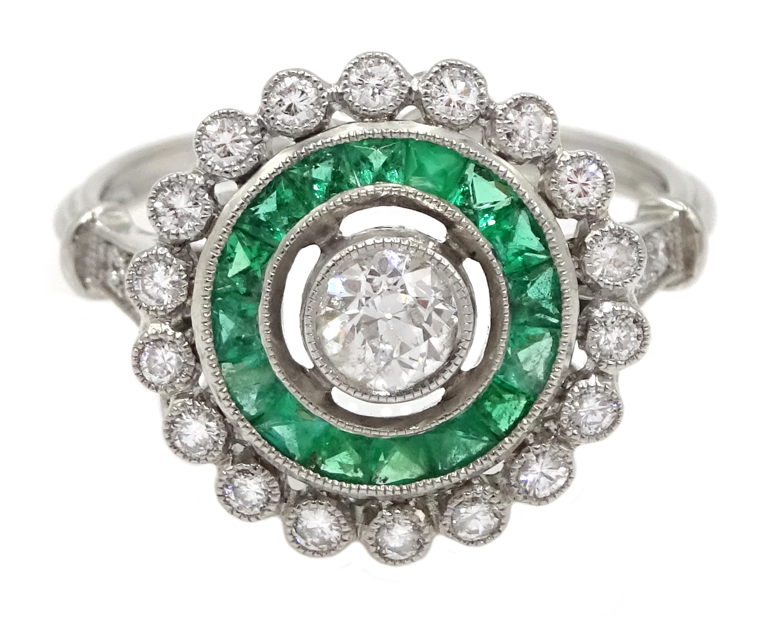 Edwardian style platinum, emerald and diamond cluster ring, central old cut diamond surrounded by c