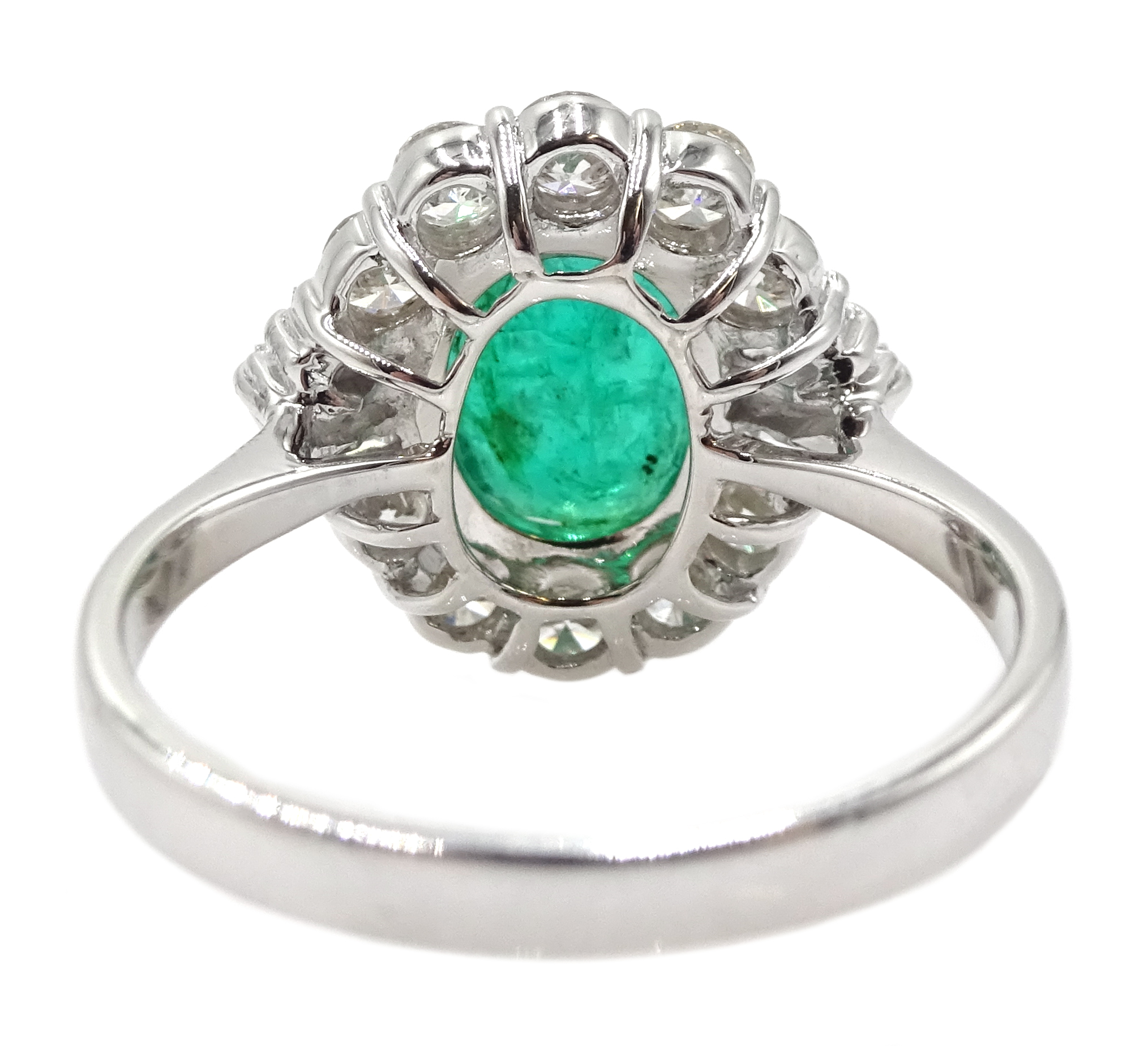 18ct white gold, emerald and diamond ring, set with a central oval shaped emerald, emerald total wei - Image 6 of 6