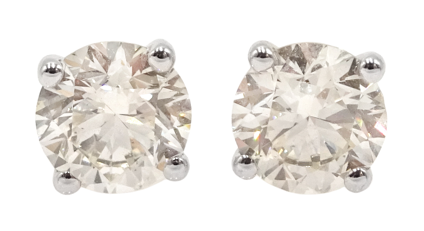 Pair 18ct gold and diamond solitaire stud earrings, diamond total weight approx 1.60 carat