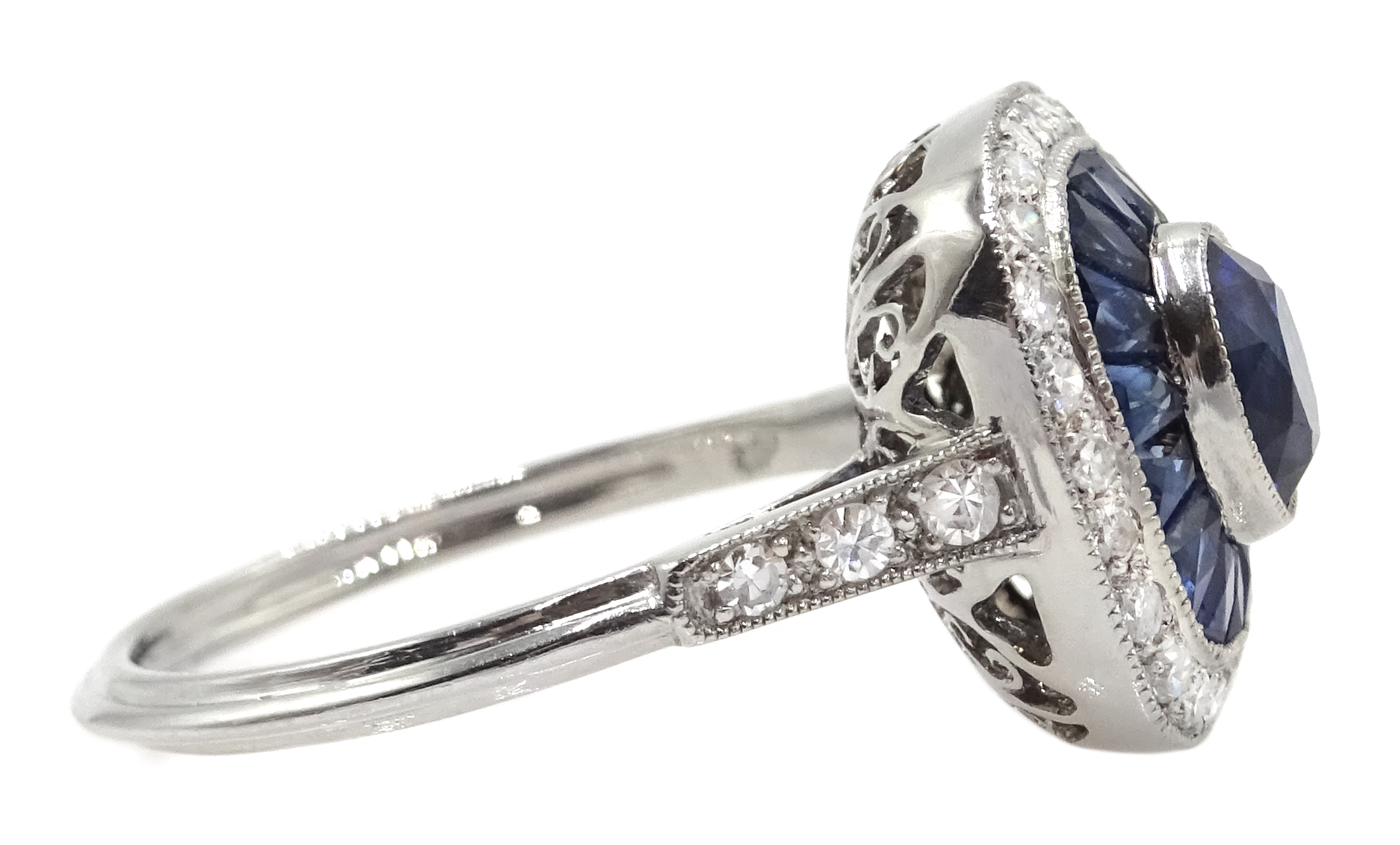 Art Deco style platinum, sapphire and diamond ring, centre oval shaped sapphire surrounded by a hal - Image 4 of 6