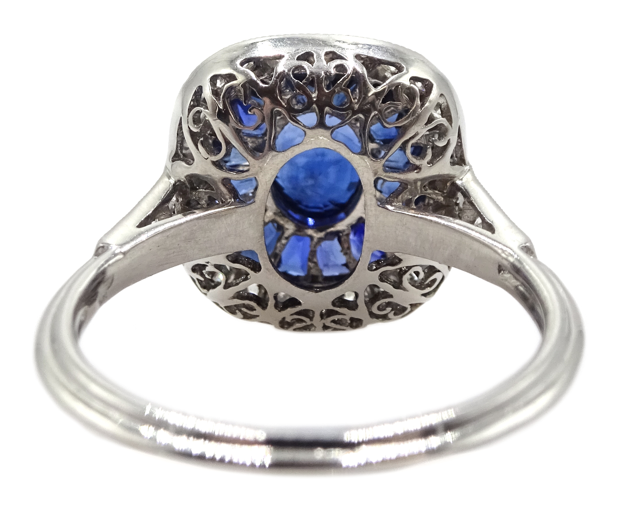 Art Deco style platinum, sapphire and diamond ring, centre oval shaped sapphire surrounded by a hal - Image 6 of 6