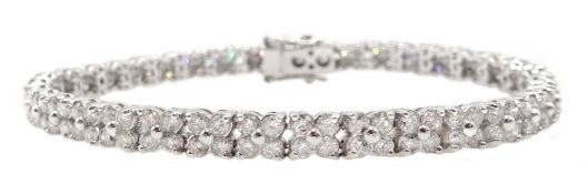 18ct white gold and diamond flower head style bracelet, round brilliant cut diamonds, diamond total