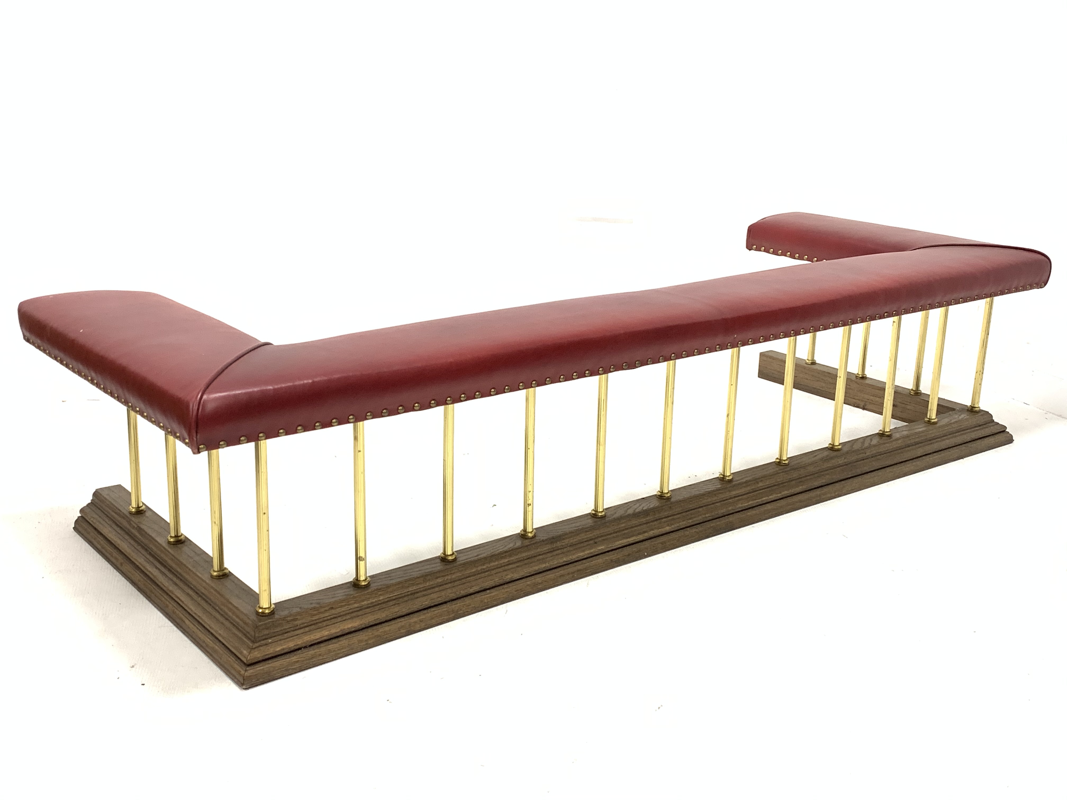 Late 20th century club fender, red studded faux leather upholstered seat raised on reeded brass - Image 2 of 6