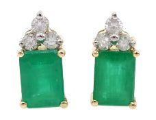Pair of 14ct gold emerald and diamond stud earrings, stamped 585, emerald total weight approx 1.95