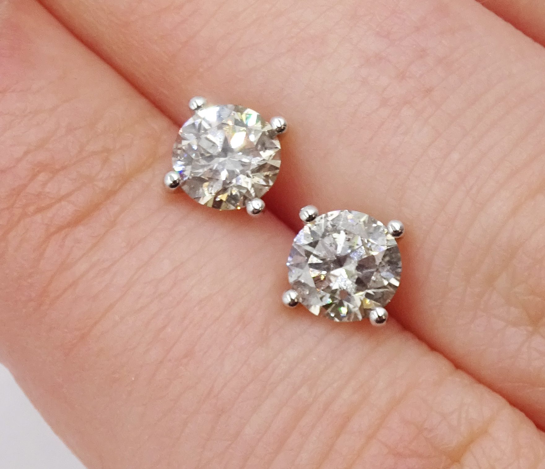 Pair of 18ct white gold brilliant cut diamond stud earrings, stamped 750, total diamond weight - Image 3 of 3