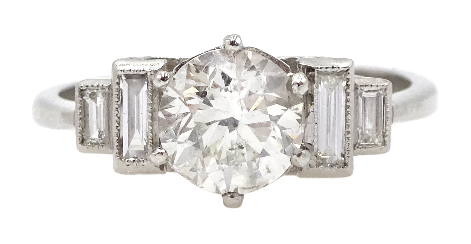 Art Deco style platinum ring set with central old cut diamond and diamonds to shoulders, central