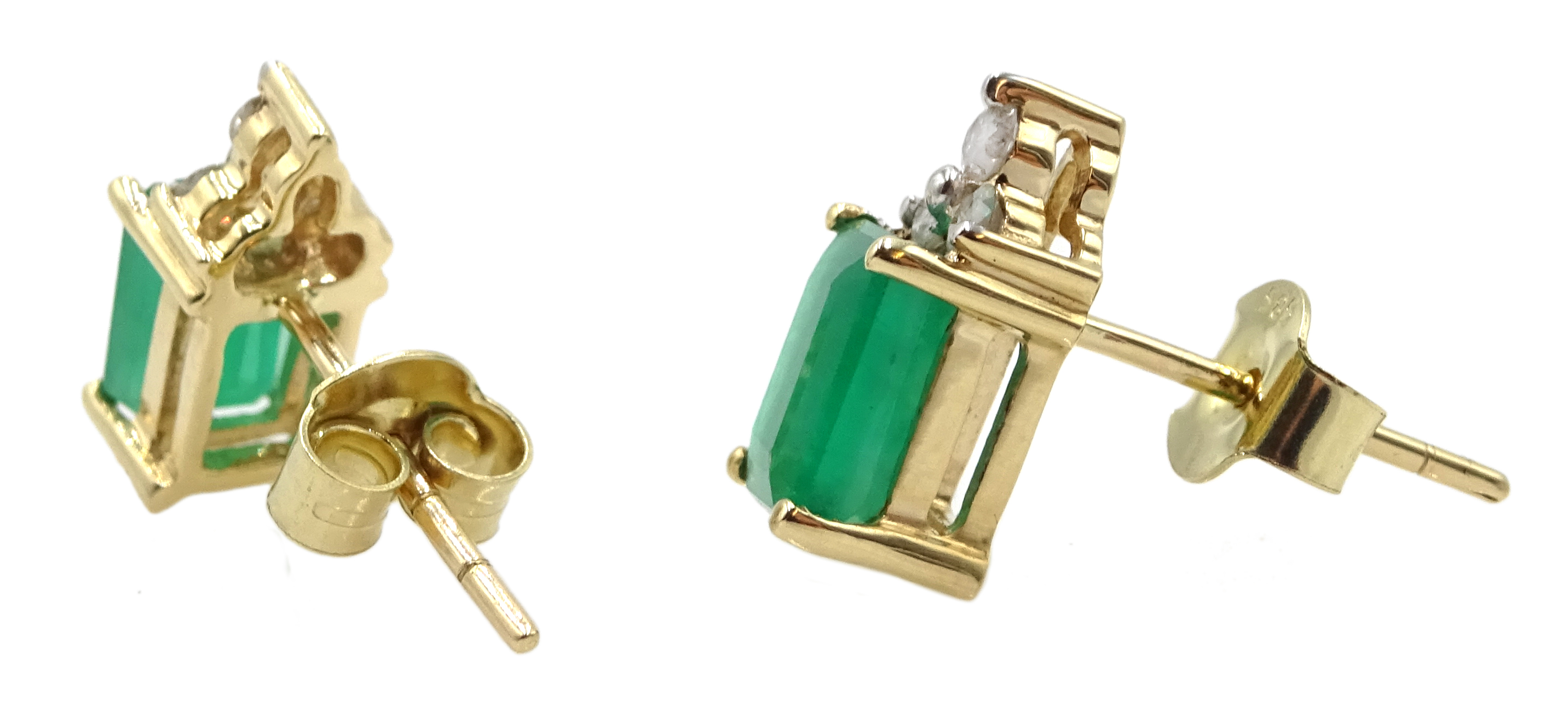 Pair of 14ct gold emerald and diamond stud earrings, stamped 585, emerald total weight approx 1.95 - Image 2 of 2