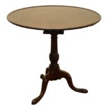 George III mahogany tripod table, circular dished birdcage tilt top on vase turned reeded column and