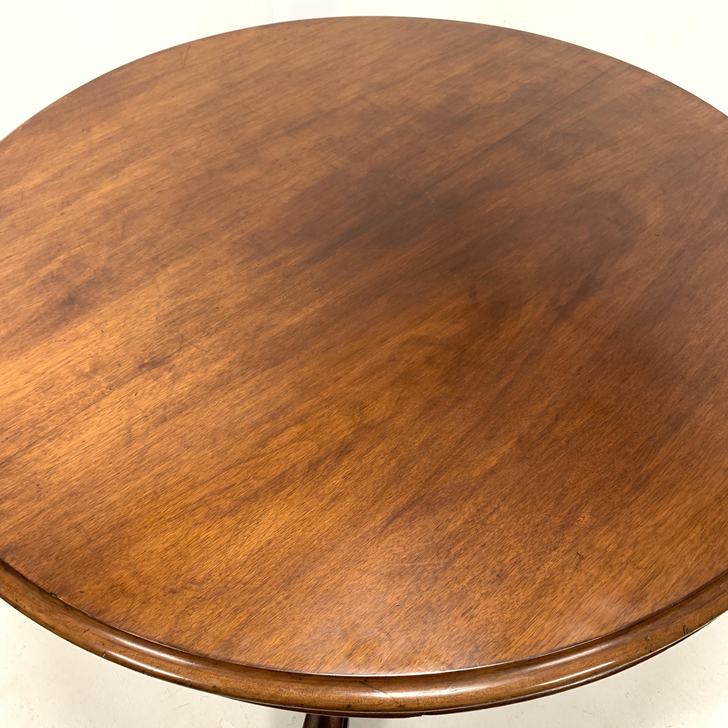 Victorian mahogany breakfast table, circular moulded tilt top on turned pedestal, four shaped out - Image 5 of 6