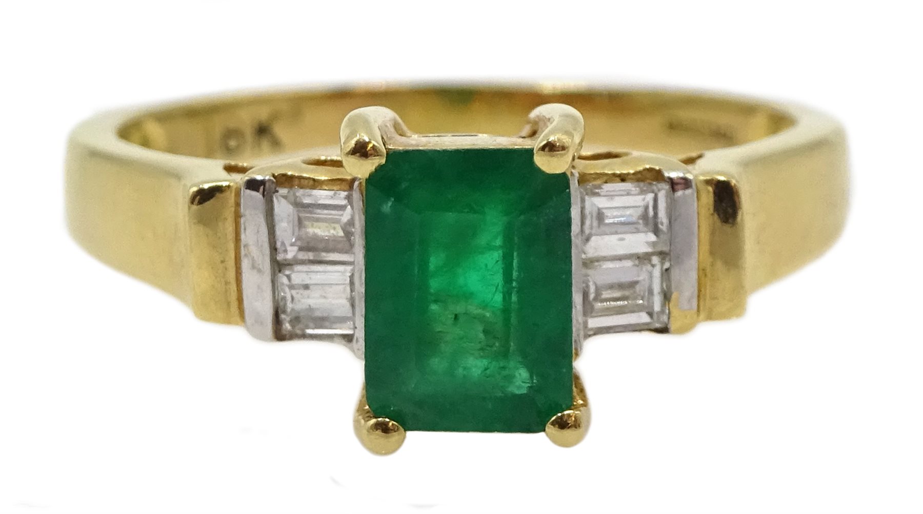 18ct gold emerald ring, with four baguette diamonds either side, hallmarked, emerald approx 0.80