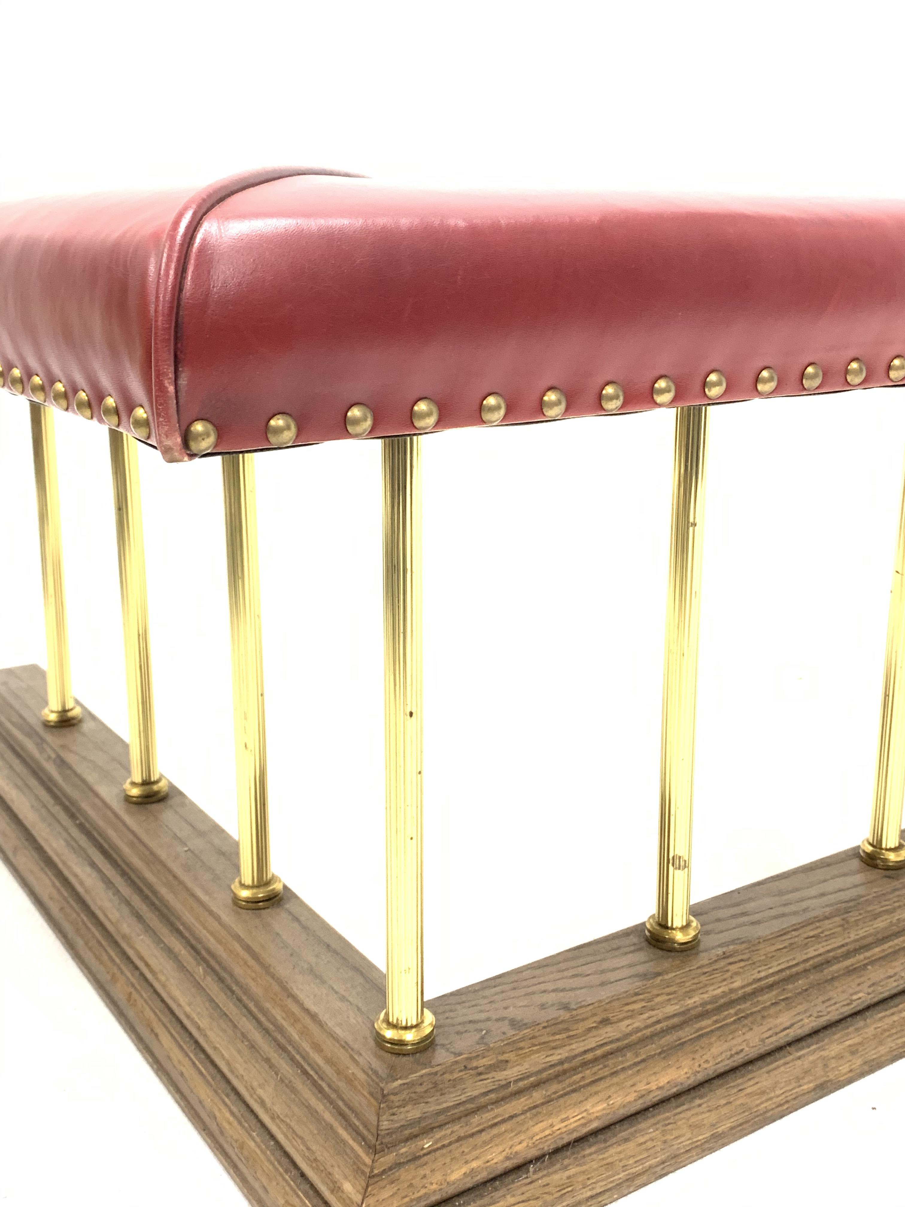 Late 20th century club fender, red studded faux leather upholstered seat raised on reeded brass - Image 3 of 6
