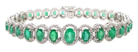 18ct gold graduating oval emerald bracelet, each emerald surrounded by brilliant cut diamonds, total