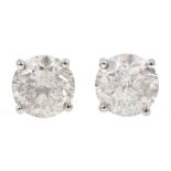 Pair of 18ct white gold diamond stud earrings, stamped 750, diamond total weight 3.52 carat, free UK