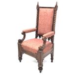19th century Puginesque mahogany throne chair, the upholstered back surrounded by figured mahogany