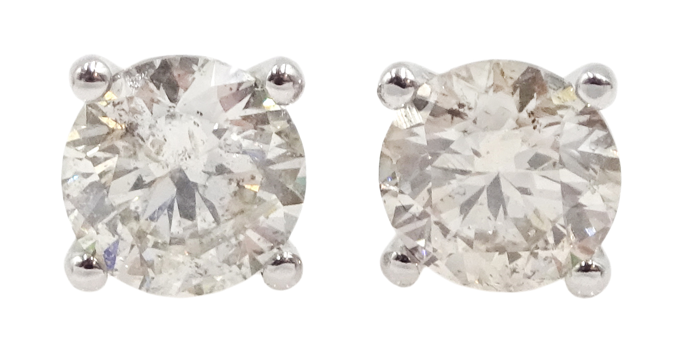 Pair of 18ct white gold brilliant cut diamond stud earrings, stamped 750, total diamond weight