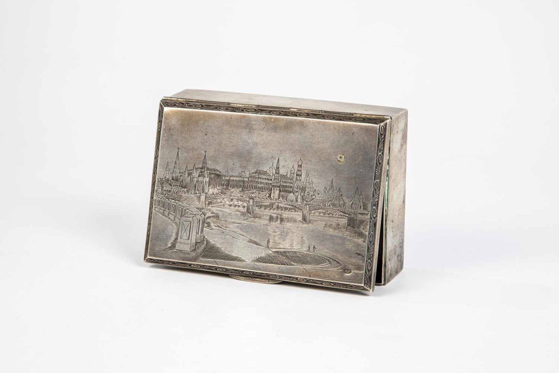 Silver tin with engraved architectual view of Moscow. Russia, 20th century. Gilt interior.Bearing