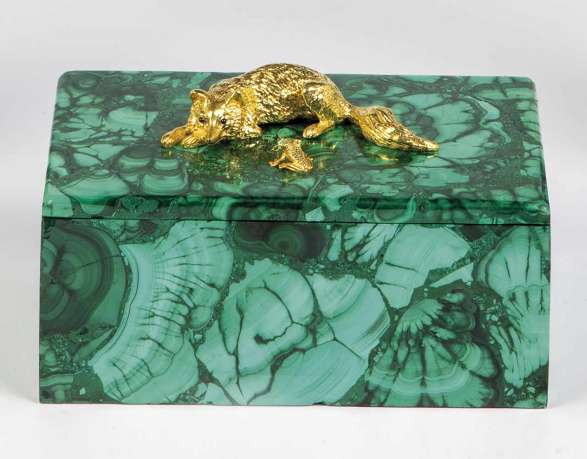 A malachite box. Russia, 20th century. Lid with applied realistically carved silver-giltfox and