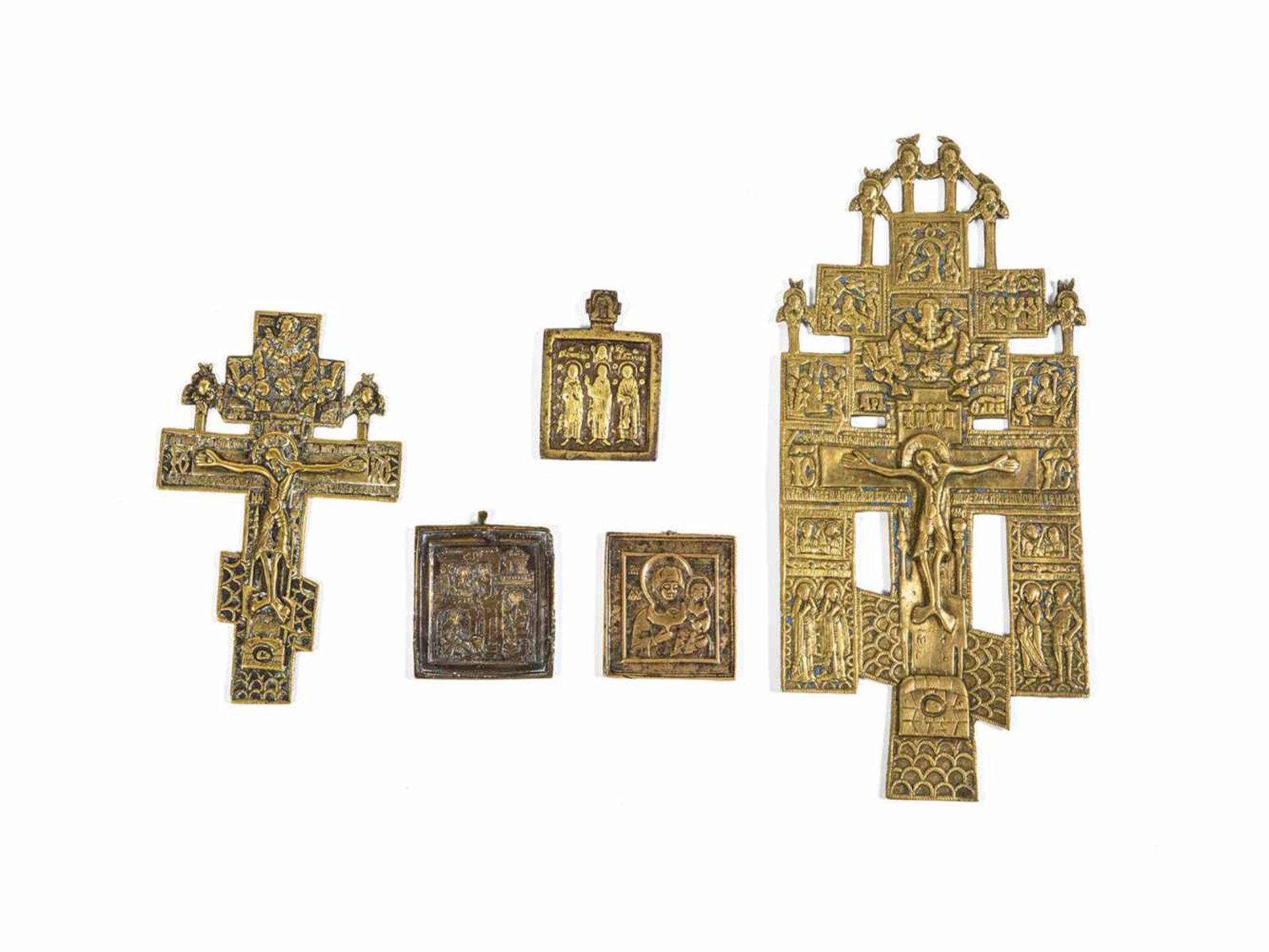 Five brass icons. Russia, 18th/19th century. Cast in relief. Three gilded icons, two