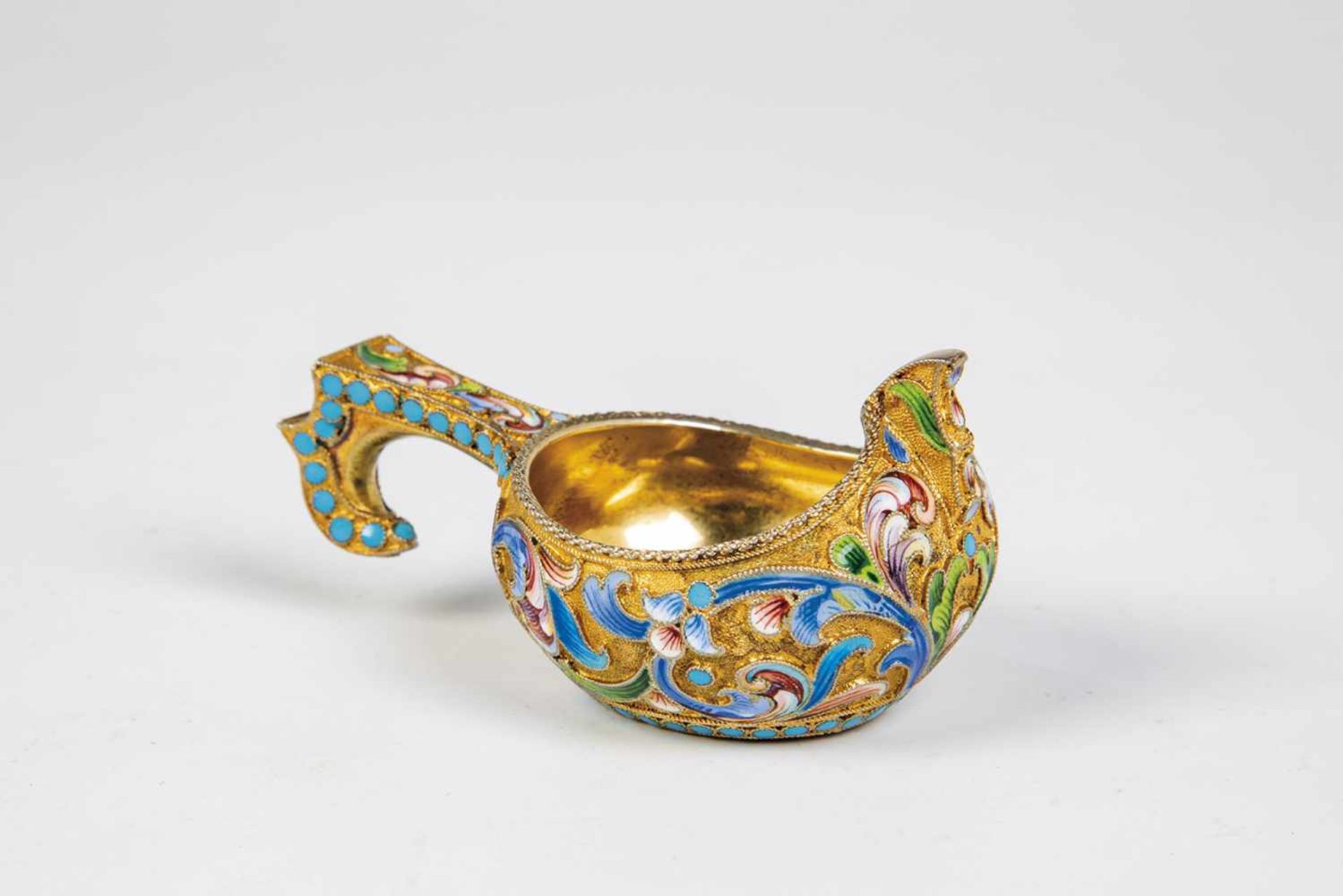 A tiny silver-gilt and cloisonné enamel kovsh-form salt. Russia, Moscow Maria Semenova,1896-1908.