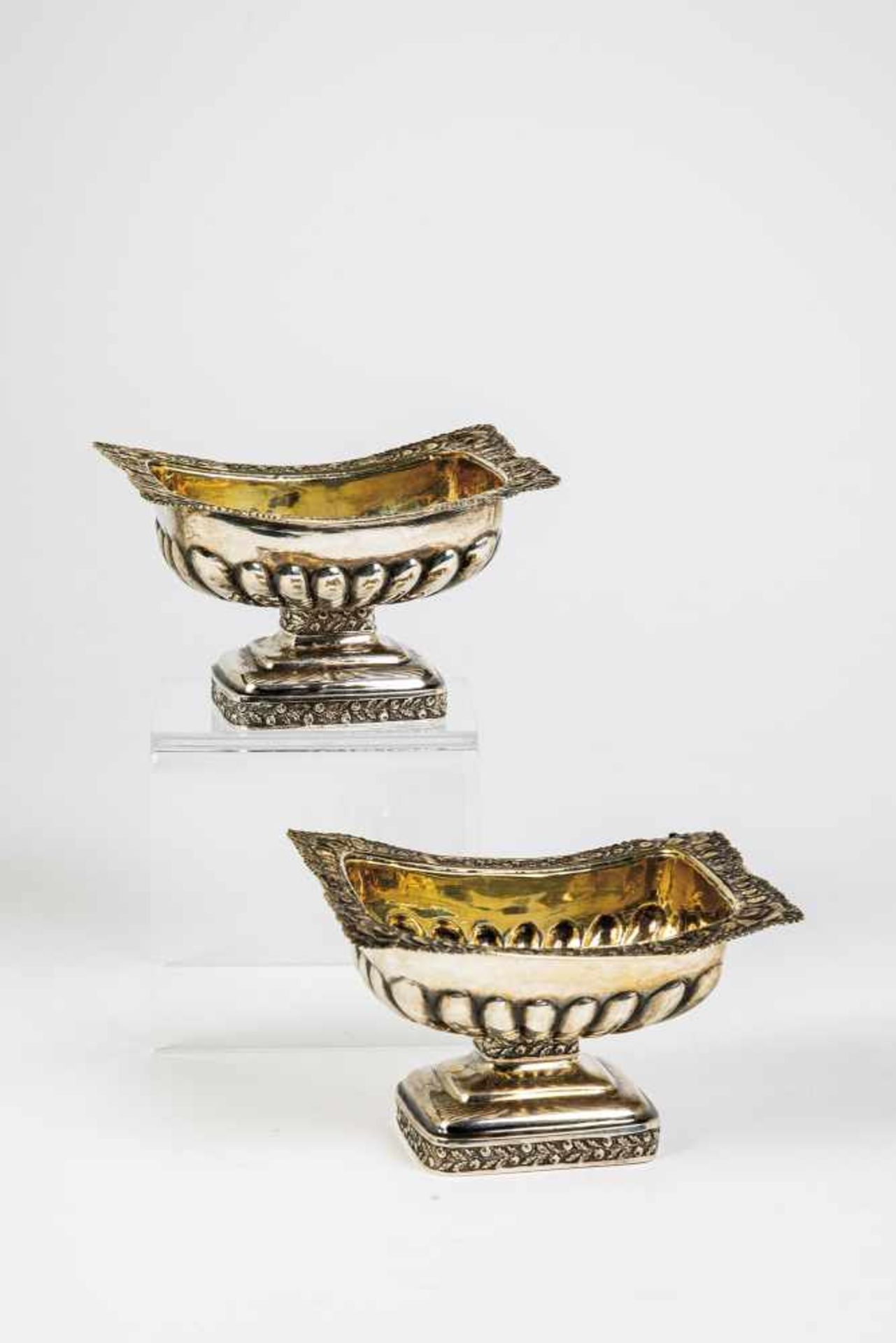 Two partial-gilt silver salt cellars. Russia, St. Petersburg, Eliad Modig (Master 1822),1826. Foot