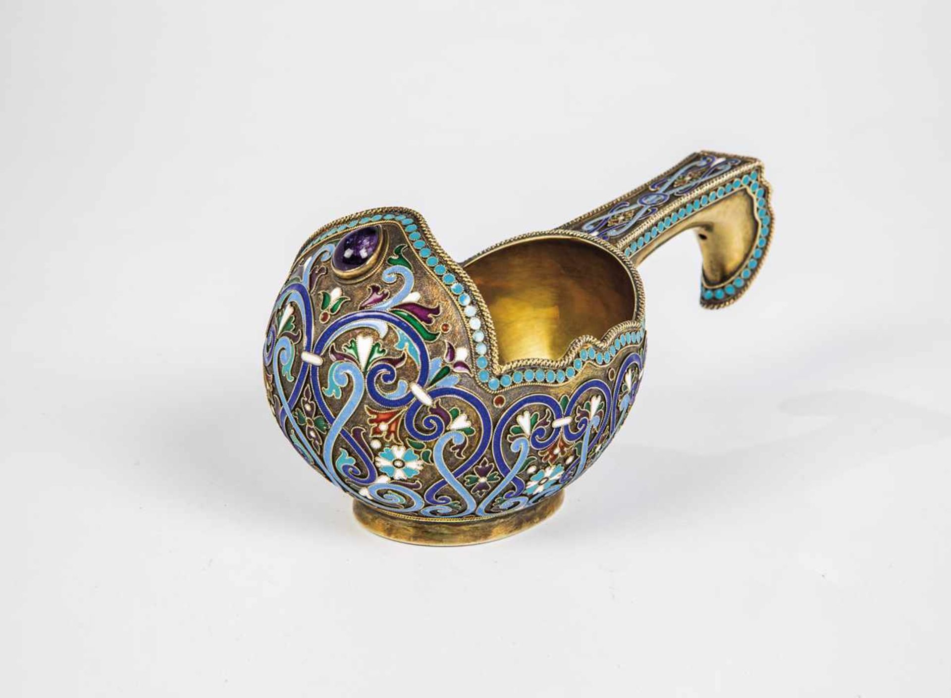 A silver-gilt and cloisonné-enamel kovsh. 2nd half of the 20th century. Body withpolychrome enamel