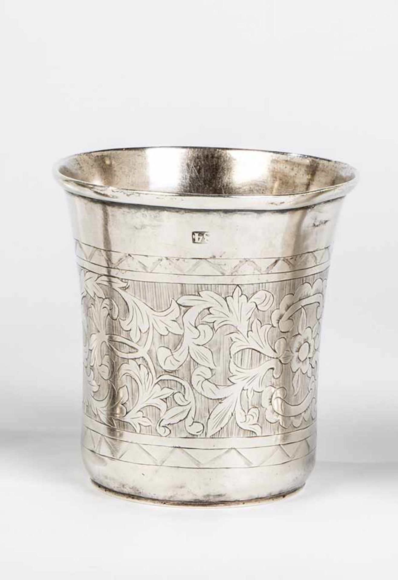 A silver beaker. Russia, Zhytomyr, 1862. Body with engraved foliage. Stamped withhallmark, 84-