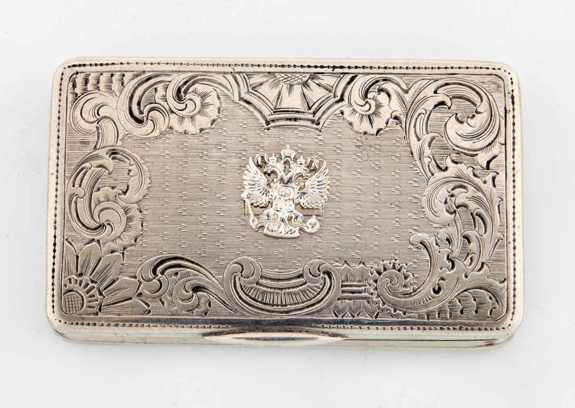 A silver cigarette case. Russia, 2nd half of the 20th century. Engraved and guillocheddecor. Applied