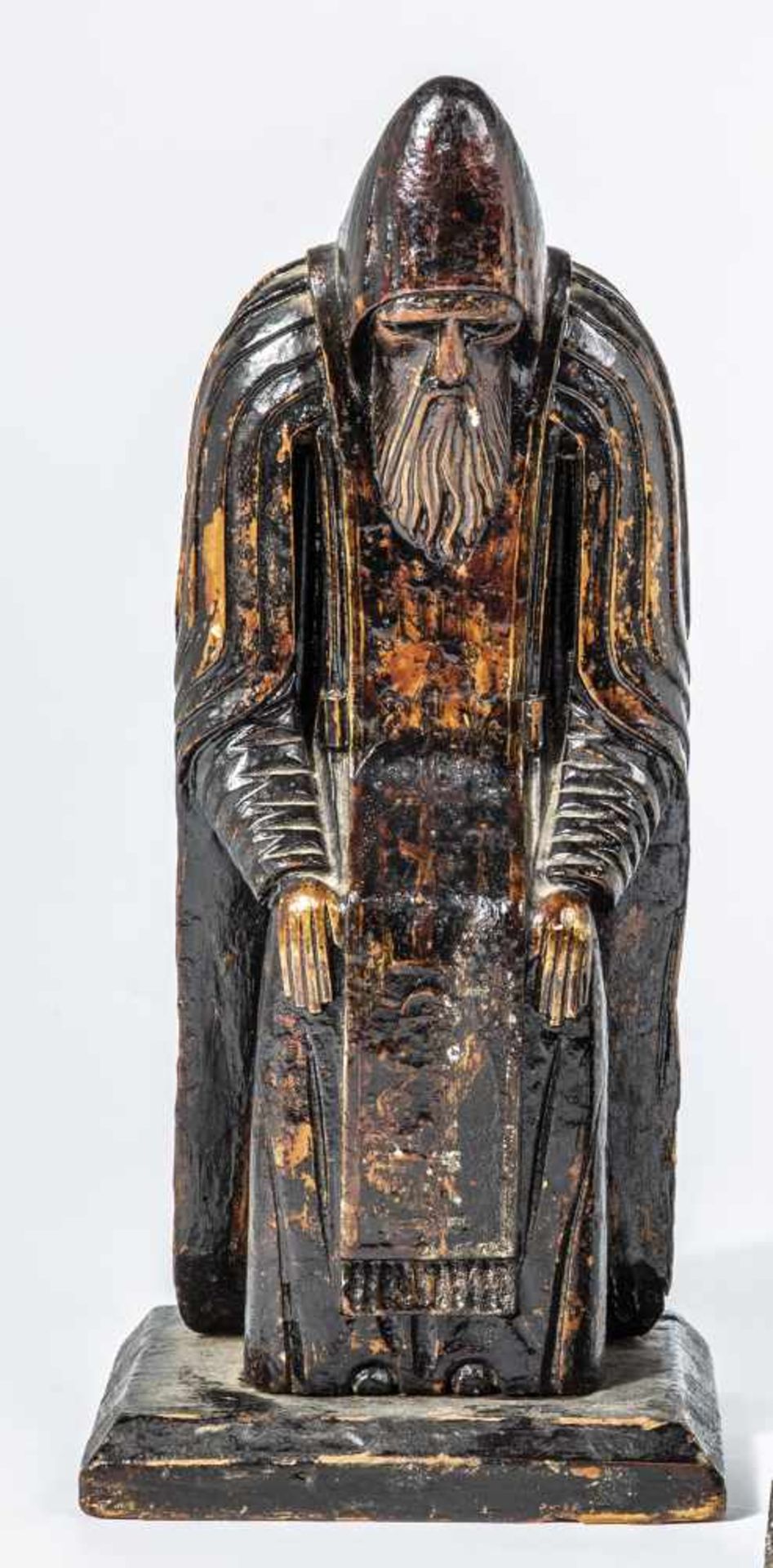 A large wood carving of St. Nil Stolbenskiy. Russia, 19th century. On squared base.Losses. 26 cm