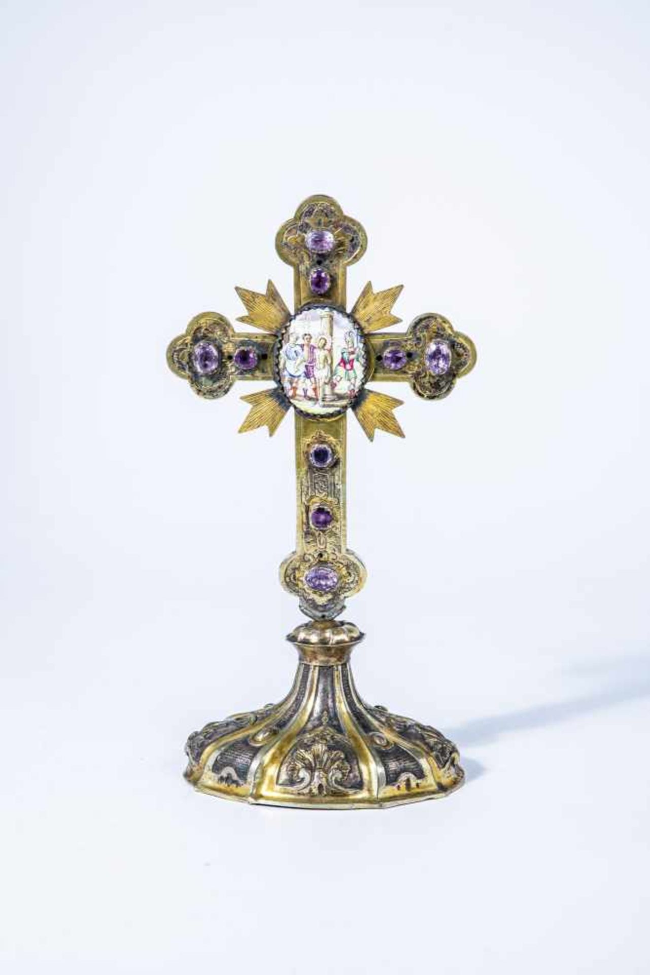 A gilded copper crucifix with finift icon. 19th century. Gilded crucifixwith embossed andengraved