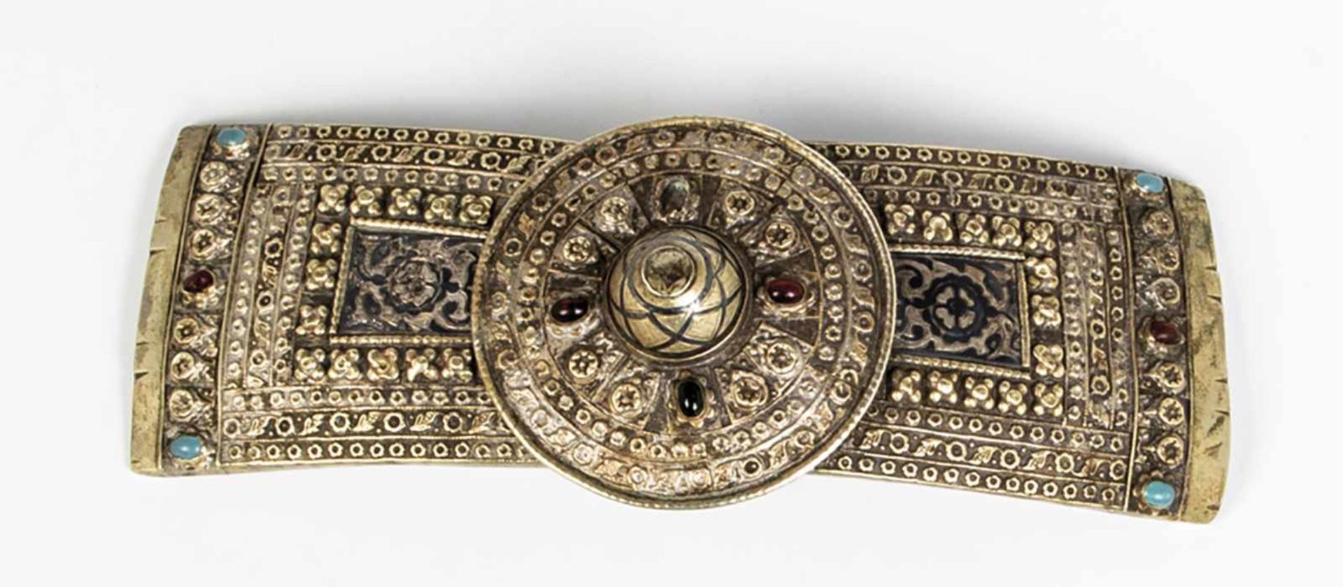 A large plated partial-nielloed buckle belt. Caucasus, circa 1900. Set with 10 cabochons(one