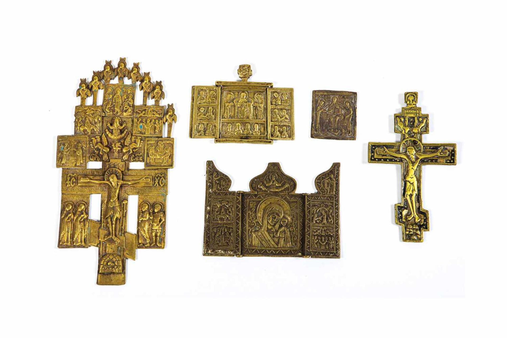 Five brass icons. Russia, 18th/19th century. Cast in relief. Three gilded, two withpolychrome